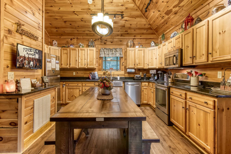 Large open kitchen and seating for 10 to 12 people New appliances & Roku HDTV.